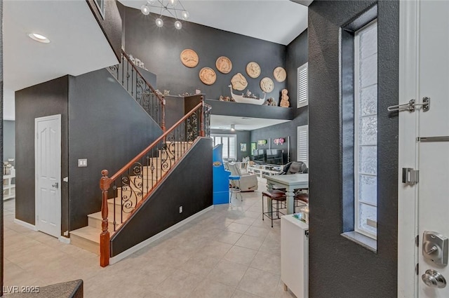 11417 Rock Cove Way, Las Vegas, NV 89141 - entrance foyer featuring a towering ceiling, stairway, and tile patterned floors