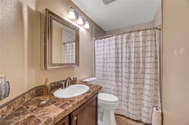 11417 Rock Cove Way, Las Vegas, NV 89141 - full bath featuring vanity, curtained shower, and a textured wall