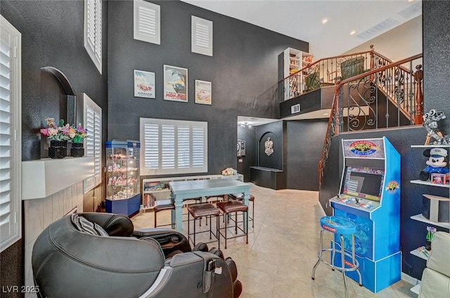 11417 Rock Cove Way, Las Vegas, NV 89141 - playroom with a towering ceiling and tile patterned floors