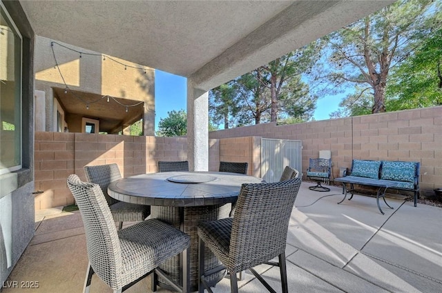11417 Rock Cove Way, Las Vegas, NV 89141 - fenced backyard featuring a patio area and outdoor dining space