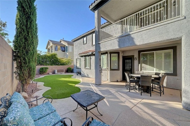 11417 Rock Cove Way, Las Vegas, NV 89141 - patio / terrace featuring a fenced backyard, a patio area, and outdoor dining space