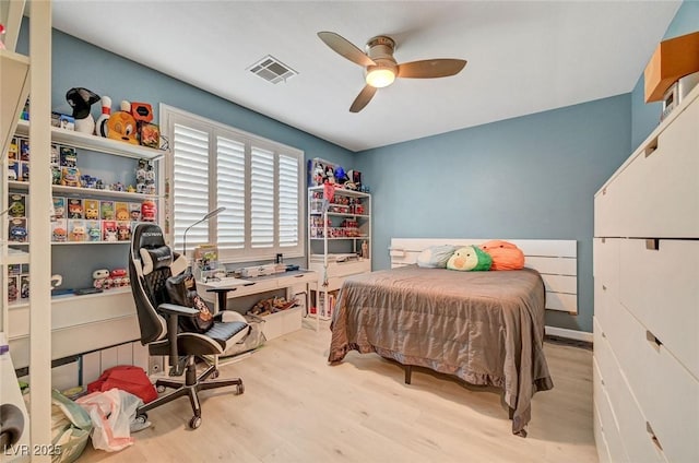 11417 Rock Cove Way, Las Vegas, NV 89141 - bedroom featuring wood finished floors, a desk, and ceiling fan