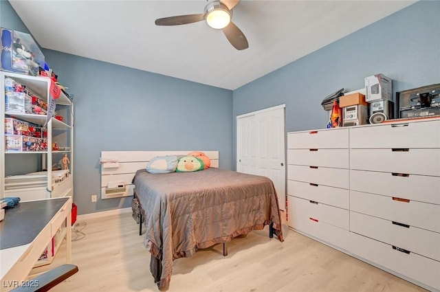 11417 Rock Cove Way, Las Vegas, NV 89141 - bedroom with wood finished floors, a closet, and a ceiling fan