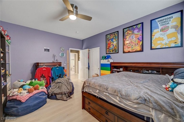 11417 Rock Cove Way, Las Vegas, NV 89141 - bedroom with wood finished floors, a ceiling fan, and a closet