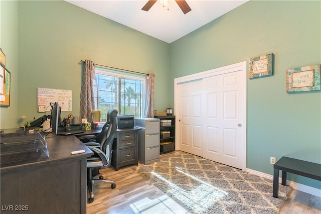 5600 Segolilly Cir, Las Vegas, NV 89130 - home office with a ceiling fan and light wood-style floors