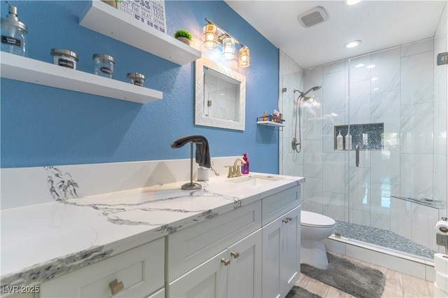 5600 Segolilly Cir, Las Vegas, NV 89130 - full bath with a shower stall, vanity, and recessed lighting