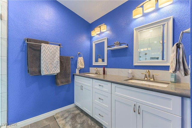 5600 Segolilly Cir, Las Vegas, NV 89130 - full bath with lofted ceiling, double vanity, tile patterned flooring, and a textured wall