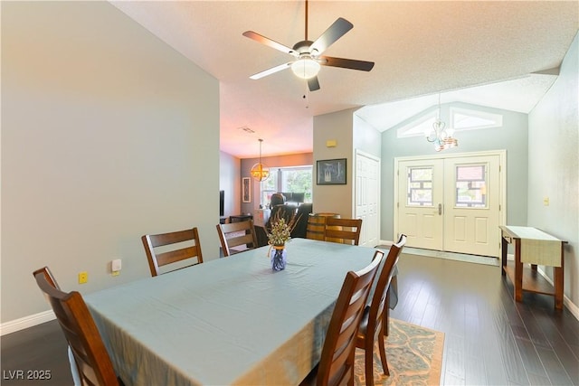 5600 Segolilly Cir, Las Vegas, NV 89130 - dining space with vaulted ceiling, a chandelier, dark wood-style flooring, and ceiling fan