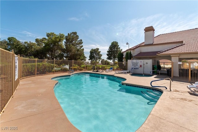 5600 Segolilly Cir, Las Vegas, NV 89130 - community pool featuring a patio area