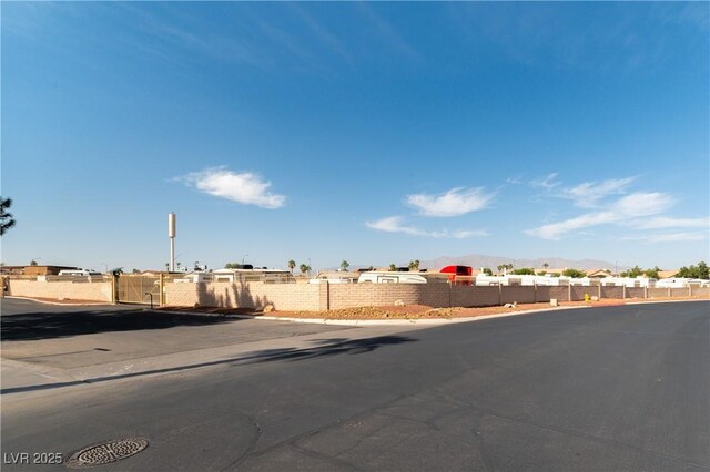 5600 Segolilly Cir, Las Vegas, NV 89130 - view of asphalt street with curbs