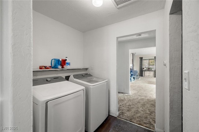 3951 W Blosser Ranch Rd, Pahrump, NV 89060 - laundry room with separate washer and dryer, dark wood-style flooring, and a textured wall