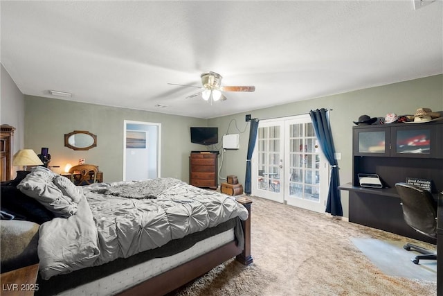 3951 W Blosser Ranch Rd, Pahrump, NV 89060 - carpeted bedroom featuring an office area, a ceiling fan, access to exterior, and french doors
