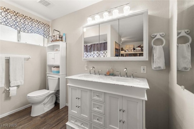 3951 W Blosser Ranch Rd, Pahrump, NV 89060 - full bathroom with double vanity and wood finished floors