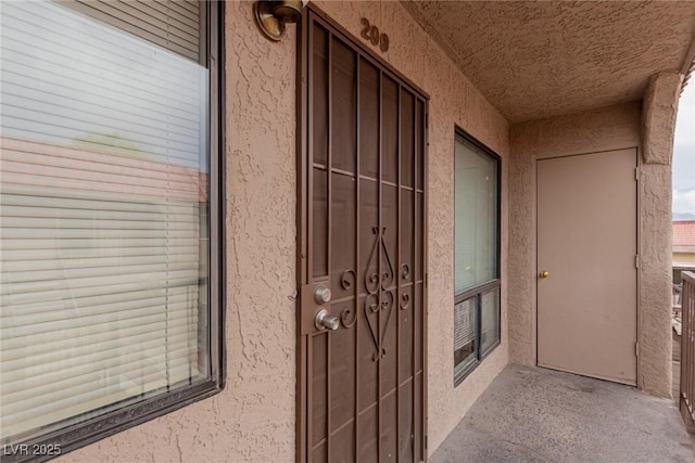 4300 N Lamont St Unit 209, Las Vegas, NV 89115 - property entrance featuring stucco siding