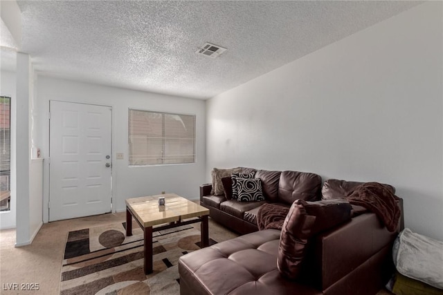 4300 N Lamont St Unit 209, Las Vegas, NV 89115 - living area with light carpet and a textured ceiling