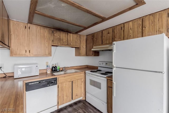 4300 N Lamont St Unit 209, Las Vegas, NV 89115 - kitchen featuring white appliances, under cabinet range hood, and dark wood-type flooring
