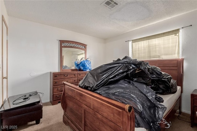 4300 N Lamont St Unit 209, Las Vegas, NV 89115 - carpeted bedroom with a textured ceiling and baseboards