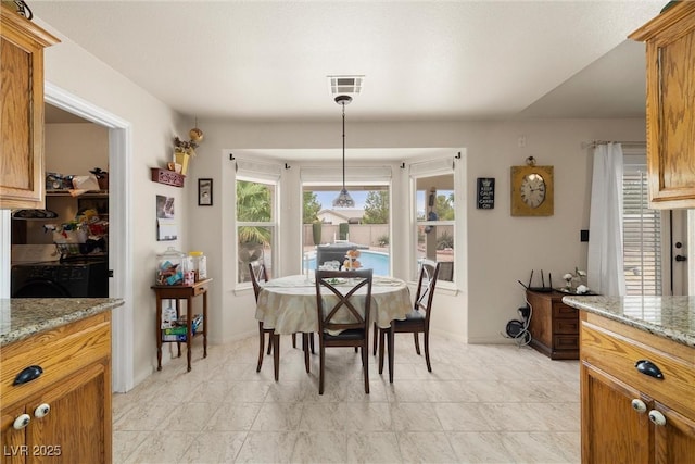 180 W Wilson Rd, Pahrump, NV 89048 - dining area with washer / dryer