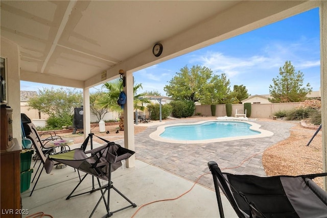 180 W Wilson Rd, Pahrump, NV 89048 - view of swimming pool with a patio and a fenced backyard