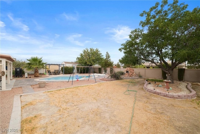180 W Wilson Rd, Pahrump, NV 89048 - view of swimming pool with a patio and a pergola