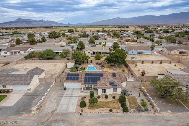 180 W Wilson Rd, Pahrump, NV 89048 - aerial view of residential area with mountains and a pool area