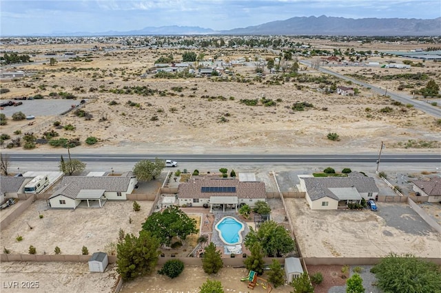 180 W Wilson Rd, Pahrump, NV 89048 - aerial view of sparsely populated area with a desert landscape and a mountain backdrop