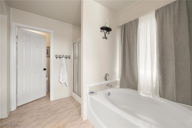 180 W Wilson Rd, Pahrump, NV 89048 - bathroom with a bath and a shower stall