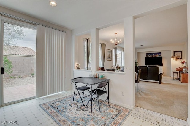 7427 Wagonwheel Ranch Way, Las Vegas, NV 89113 - dining room with a chandelier, recessed lighting, and carpet flooring
