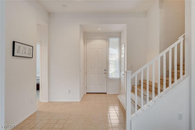 7427 Wagonwheel Ranch Way, Las Vegas, NV 89113 - entryway with stairs and tile patterned flooring