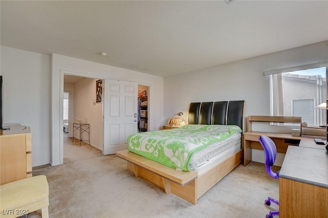 7427 Wagonwheel Ranch Way, Las Vegas, NV 89113 - bedroom featuring light colored carpet and a spacious closet