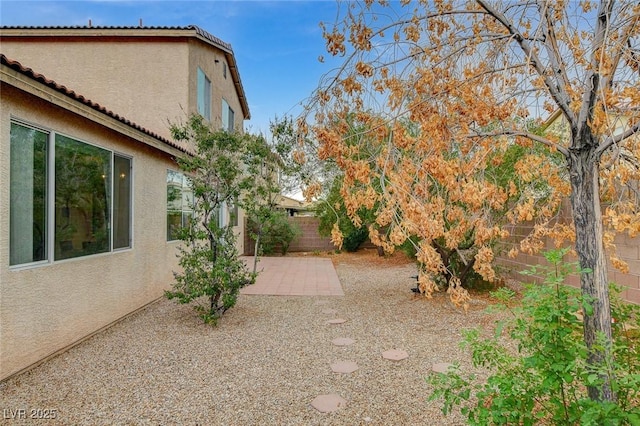 7427 Wagonwheel Ranch Way, Las Vegas, NV 89113 - fenced backyard featuring a patio area