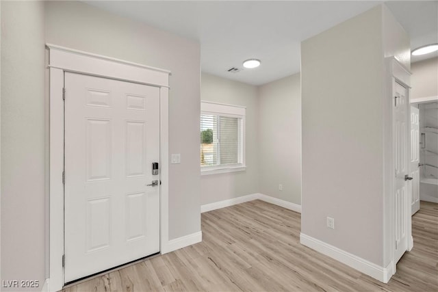 2120 Upland Ave, Pahrump, NV 89048 - entryway with light wood-style flooring and baseboards