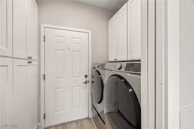 2120 Upland Ave, Pahrump, NV 89048 - washroom with separate washer and dryer, cabinet space, and light wood finished floors