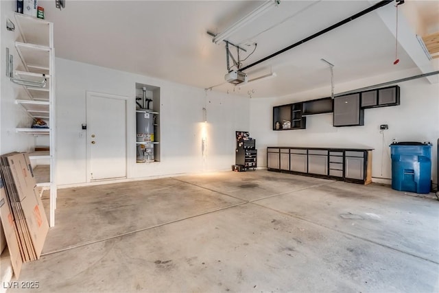 2245 Juniper Berry Dr, Las Vegas, NV 89134 - garage with secured water heater and a garage door opener