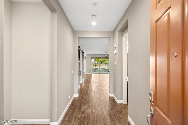 2116 Canvas Edge Dr, Henderson, NV 89044 - hallway featuring wood finished floors and baseboards