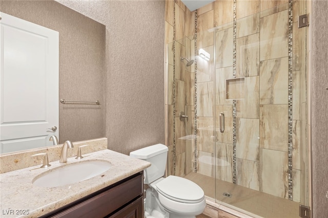 2116 Canvas Edge Dr, Henderson, NV 89044 - bathroom with a textured wall, vanity, and a stall shower