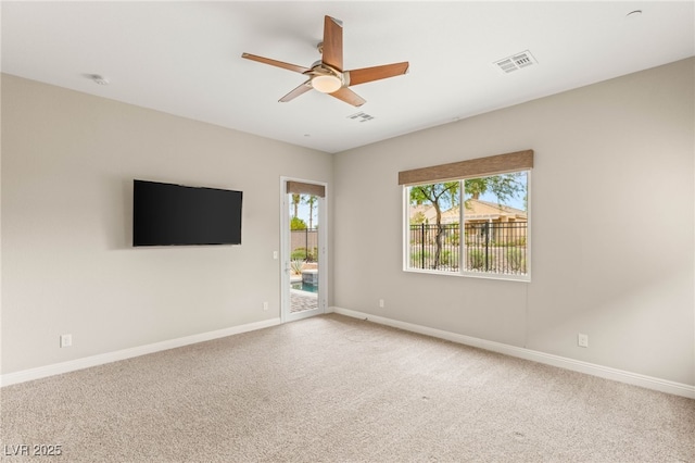 2116 Canvas Edge Dr, Henderson, NV 89044 - spare room with ceiling fan, light carpet, and a smoke detector