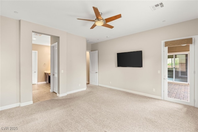 2116 Canvas Edge Dr, Henderson, NV 89044 - unfurnished living room featuring light carpet and ceiling fan