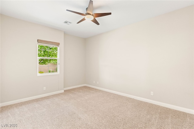 2116 Canvas Edge Dr, Henderson, NV 89044 - empty room with light colored carpet and a ceiling fan