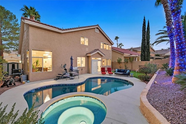 2021 Waterbury Ln, Las Vegas, NV 89134 - view of pool featuring a patio, an outdoor living space, a storage unit, area for grilling, and a pool with connected hot tub