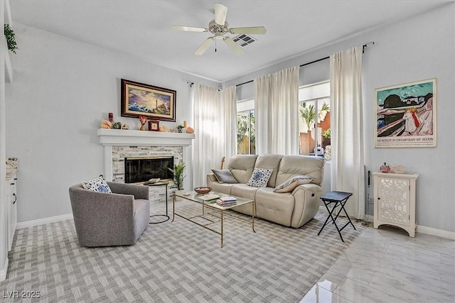 2021 Waterbury Ln, Las Vegas, NV 89134 - living room featuring ceiling fan and a stone fireplace