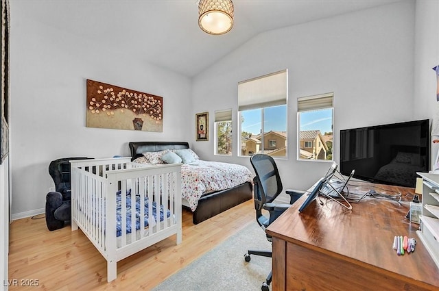 2021 Waterbury Ln, Las Vegas, NV 89134 - bedroom featuring vaulted ceiling, wood finished floors, and an office area
