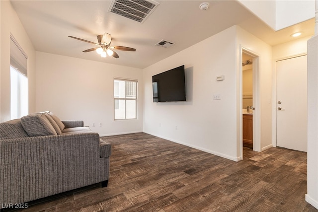3412 Bearpin Gap Ln, Las Vegas, NV 89129 - living area featuring a ceiling fan and dark wood-type flooring