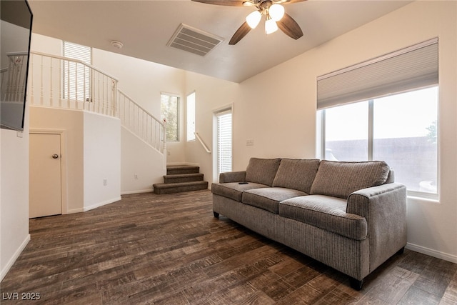 3412 Bearpin Gap Ln, Las Vegas, NV 89129 - living area featuring plenty of natural light, ceiling fan, stairway, and wood finished floors