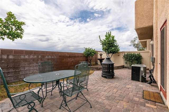 3412 Bearpin Gap Ln, Las Vegas, NV 89129 - fenced backyard featuring a patio and outdoor dining area
