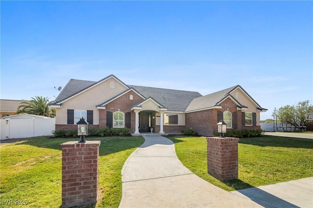 2477 Adobe Wells Dr, Logandale, NV 89021 - single story home with brick siding and stucco siding