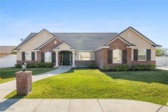 2477 Adobe Wells Dr, Logandale, NV 89021 - view of front of property featuring brick siding and stucco siding