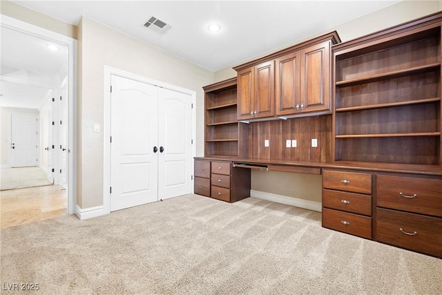 2477 Adobe Wells Dr, Logandale, NV 89021 - unfurnished office featuring light carpet and built in study area