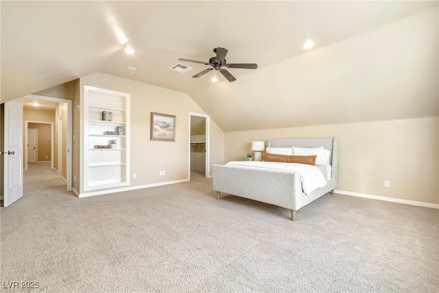 2477 Adobe Wells Dr, Logandale, NV 89021 - bedroom with vaulted ceiling, carpet floors, a ceiling fan, a spacious closet, and recessed lighting
