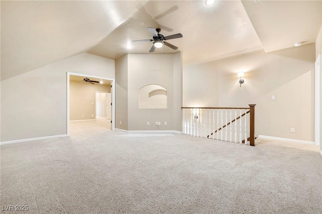 2477 Adobe Wells Dr, Logandale, NV 89021 - unfurnished room with a ceiling fan, vaulted ceiling, and carpet floors